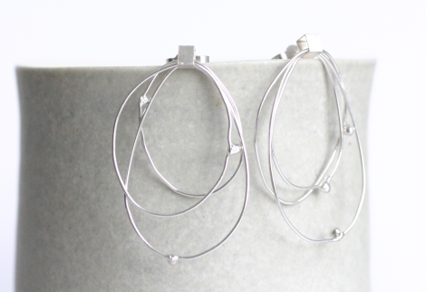 handmade silver circular satellite earrings